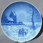 A blue and white plate with a picture of a person riding a horse

Description automatically generated