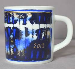 A white and blue coffee mug

Description automatically generated with low confidence